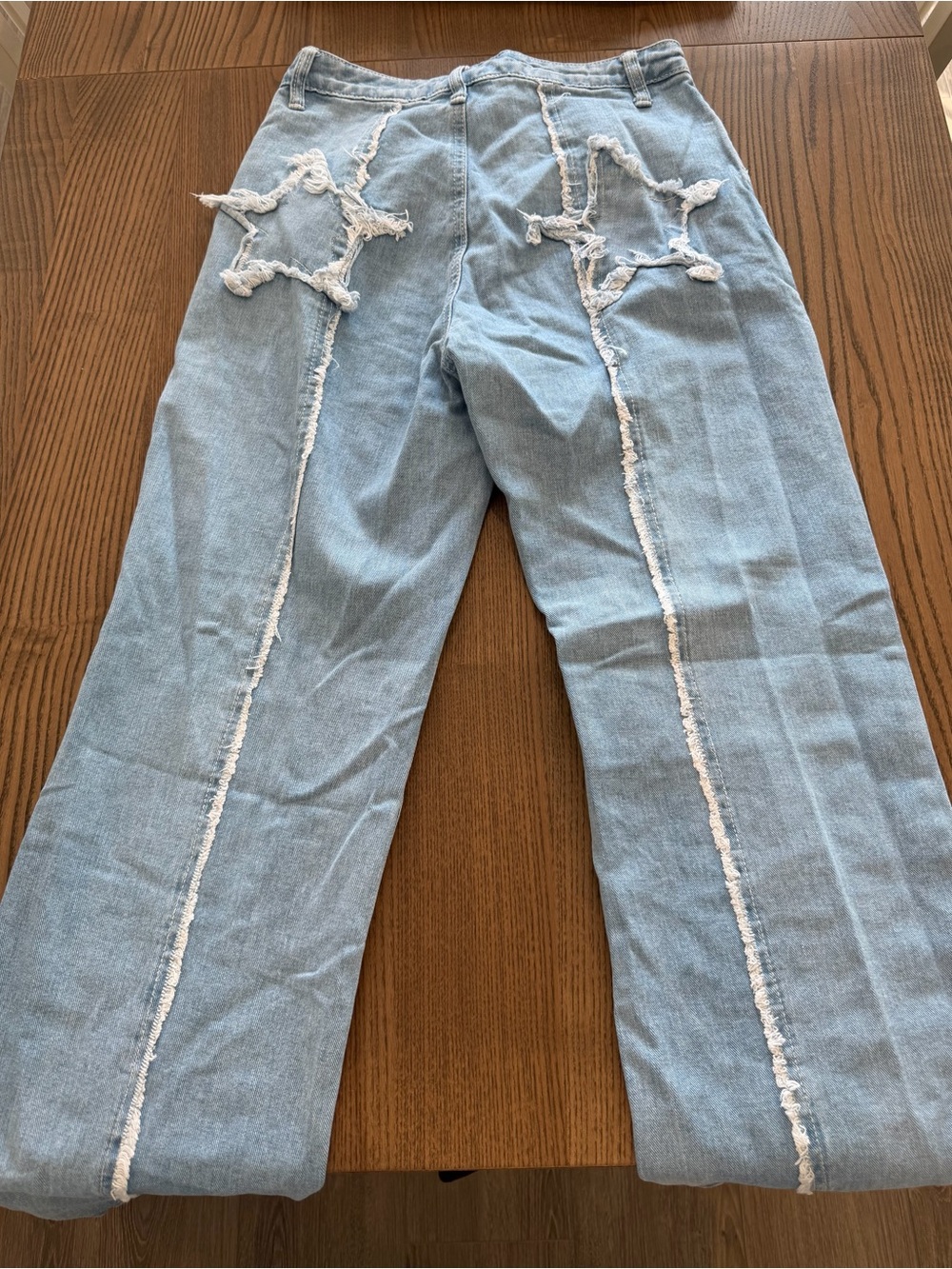 Light Blue Women's Ripped Star-Accent Jeans